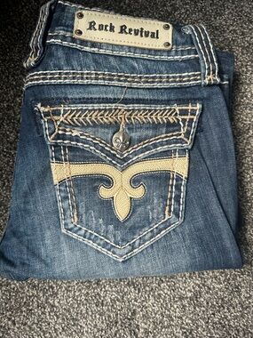 Rock Revival Women's Dark Blue Jeans with Tan Embroidery
